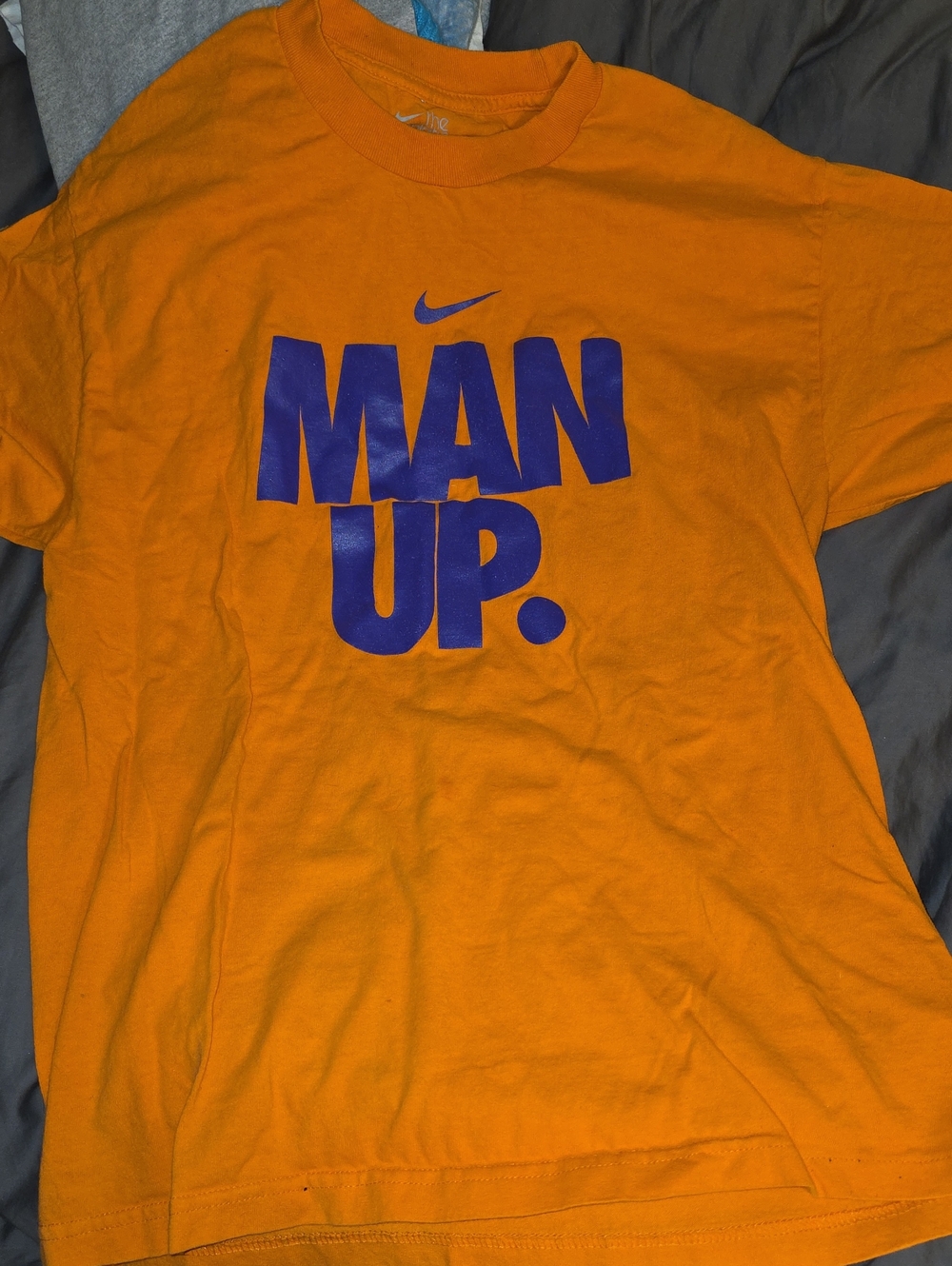 Nike Men’s Orange T-Shirt with Purple "MAN UP." Graphic